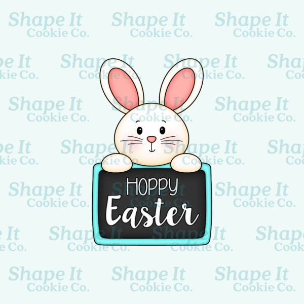 Cute bunny holding a "Happy Easter" sign cookie cutter image for Shape It Cookie Co.